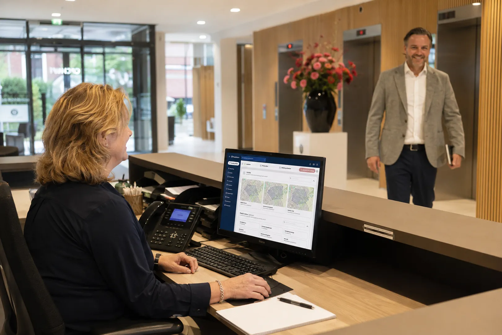 Photo of a woman at the reception desk